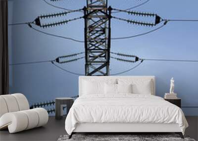 High voltage electricity transmission line on a blue sky background. Copy space for text. Wall mural