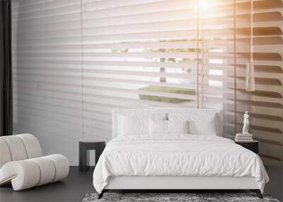 Blinds of sunlight come through the house. Wall mural