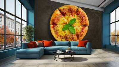 Top view of hot pizza cheese ,Tasty pizza cheese on black background. Wall mural