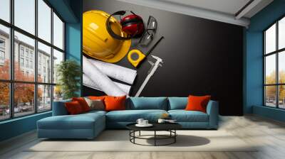 Work safety. Construction site protective equipment on wooden background, flat lay, copy space, top view Wall mural