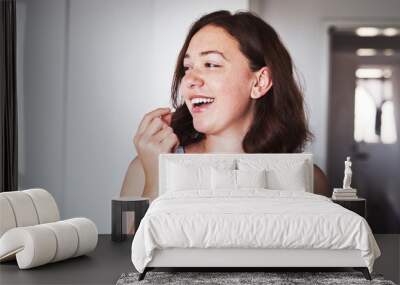 Healthcare, medication and woman drinking a pill with a glass water for wellness at her home. Medicine, medical and happy female person taking a vitamin, supplement or tablet with liquid in apartment Wall mural