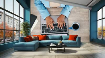 Woman, hands and laptop typing above for email, business proposal or digital report on office desk. Top view of female employee hand working on computer in communication or networking at workplace Wall mural