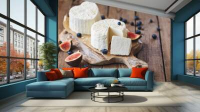 ricotta cheese on rustic cutting board over wooden table Wall mural