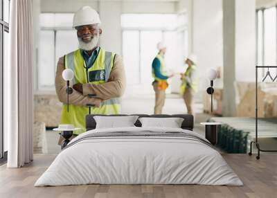 Senior black man, architect and business construction with crossed arms for building industry on site. Portrait of a confident elderly African male engineer, builder or architecture at the workshop Wall mural