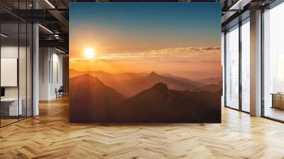 colorful sunset on top of austrian mountain alps Wall mural