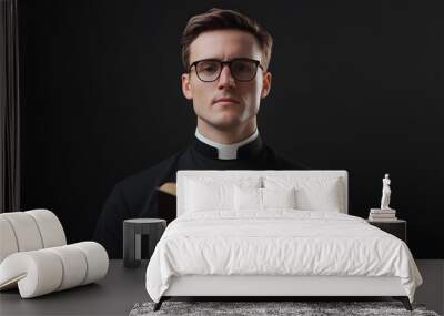 Portrait of Young Catholic Priest Holding Holy Bible, Faith and Clergy Leadership Wall mural