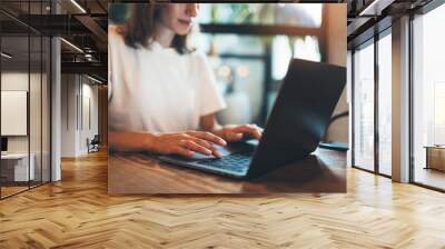 closeup finger female hands texting message using laptop at coworking workplace, hipster girl freelancer writing on keyboard at office, businesswoman working via portable computer, education process Wall mural