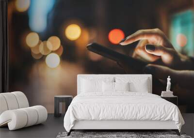 Woman pointing finger on screen smartphone on background illumination bokeh light in night  city, hipster using in hands mobile phone closeup, mockup glitter street, online wifi outdoors Wall mural