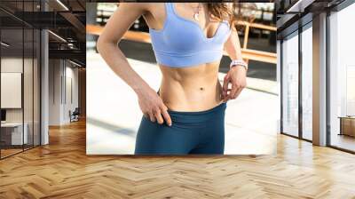 fitness girl doing sport oudoor Wall mural