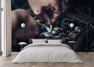 Auto mechanic working in garage. Repair service. Wall mural