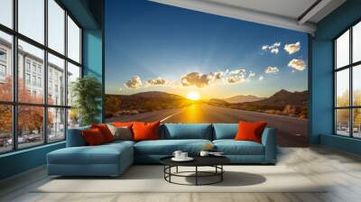 Empty long nevada mountain road to the horizon on a sunny summer day at bright sunset Wall mural