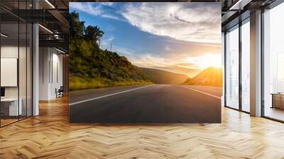 Mediterranean sea coast road into mountains horizon in summer with beautiful bright sun rays Wall mural