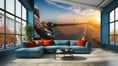 motorbike on the road riding. having fun driving the empty highway on a motorcycle tour journey Wall mural