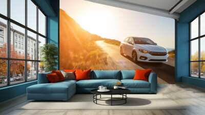 rental car in spain mountain landscape road at sunset Wall mural