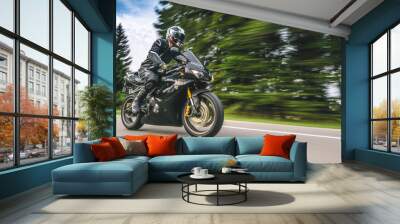 Triumph Daytona Triple Racing motorbike on the road driving fast. having fun on the empty highway Wall mural