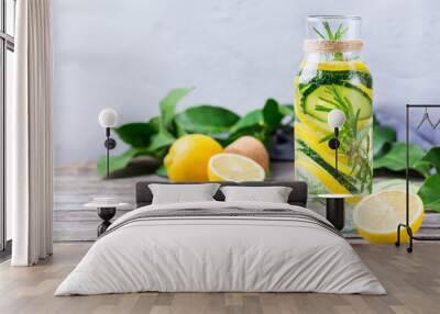 Fresh cool lemon cucumber rosemary infused water detox drink Wall mural