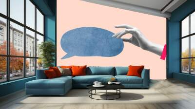 Businessman hand holding speech bubble symbolizing business cooperation and communication. Concept of business, career development, teamwork, chat, working process Wall mural