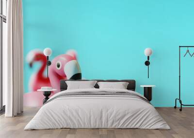 Flamingo rubber on pastel blue background. Summer concept. 3d rendering Wall mural