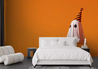 Halloween ghost with party hat on orange background. 3d rendering Wall mural