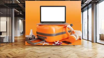 Laptop on suitcase with traveler accessories on orange background. travel concept. 3d rendering Wall mural