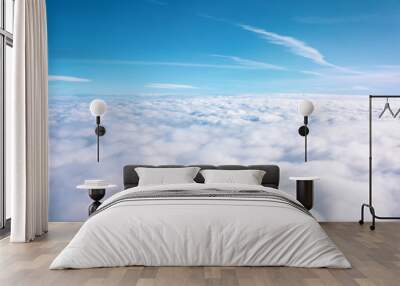 Aerial view of cloudy fields and horizon with day blue sky. Wall mural