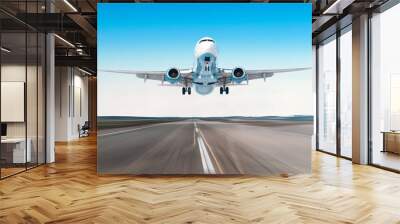 Airplane flying departure landing speed motion on a runway in the clear sky bright day. Wall mural