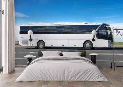 Comfortable white tourist bus on the highway in travel. Wall mural