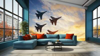 Four fighter jets in the shape of a diamond in the sky beautiful sunset. Wall mural