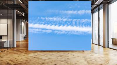 Kelvin Helmholtz instability clouds wavy on blue sky. Wall mural