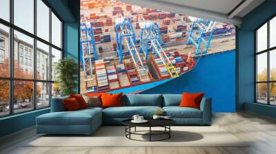 Large container ship in port. front view, unloading loading cargo. Aerial view. Wall mural