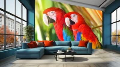 Two parrots red in tropical forest birds Wall mural