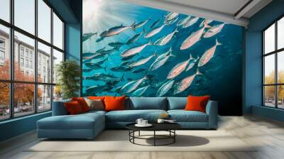 Schooling pelagic fish in crystal clear blue ocean Wall mural