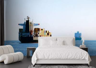 cargo ship sailing in still water Wall mural