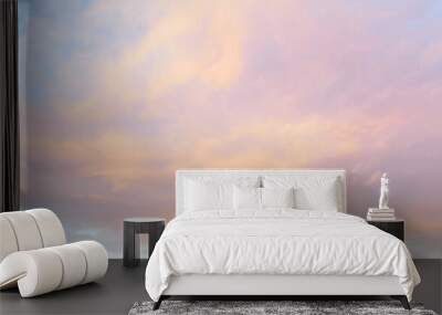 Clear blue sky. glowing pink and golden cirrus and cumulus clouds after storm, soft sunlight. Dramatic sunset cloudscape. Meteorology, heaven, peace, graphic resources, picturesque panoramic scenery Wall mural