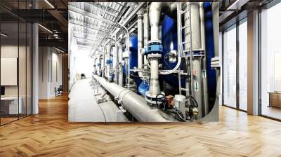 New shiny pipes, large pumps in industrial boiler room, close-up. Industry, technology, special equipment, water treatment, pure drinking water, biotechnology, chemistry, ecology, environmental damage Wall mural