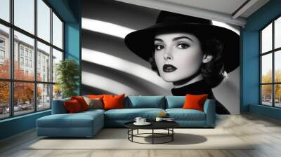 Glamorous retro portrait of a woman in a black hat, her eyes sparkling with sensuality and elegance Wall mural