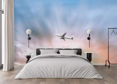 Airplane flying in the blue sky Wall mural