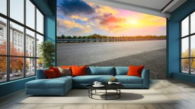 Asphalt highway and beautiful sky cloud scenery at sunset. Wall mural