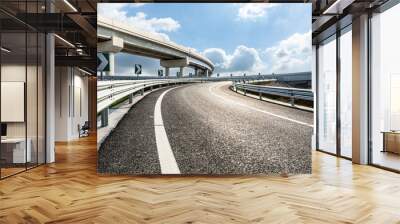 Asphalt highway and bridge under blue sky. Road and sky background. Wall mural