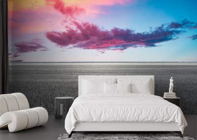 Asphalt highway road and sky sunset clouds landscape. Wall mural