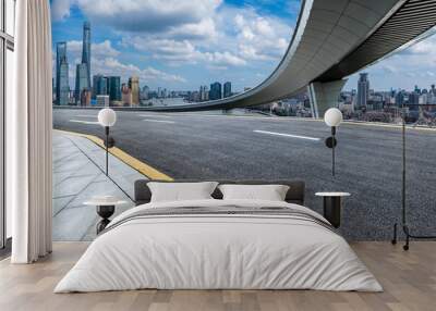 Asphalt road and bridge with city skyline scenery in Shanghai, China. Wall mural