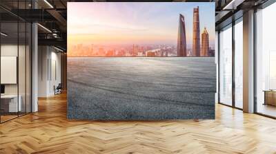 Asphalt road and city skyline with modern buildings in Shanghai at sunrise, China. Wall mural