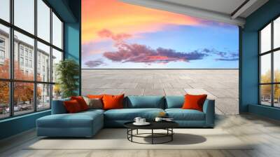 Clean square floor and beautiful colorful sky clouds at sunrise Wall mural