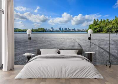 Empty asphalt road and city skyline with modern buildings scenery in Hangzhou, China. Wall mural