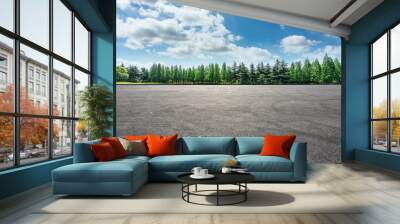 Empty asphalt road and green forest landscape Wall mural