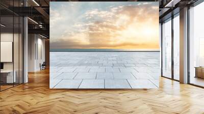 Empty square floor and blue sea with sky clouds at sunset Wall mural