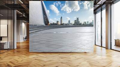 Empty square floor and brick wall with city skyline in Shanghai Wall mural