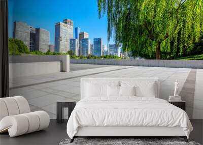 Empty square floor and modern city commercial buildings in Beijing,China. Wall mural