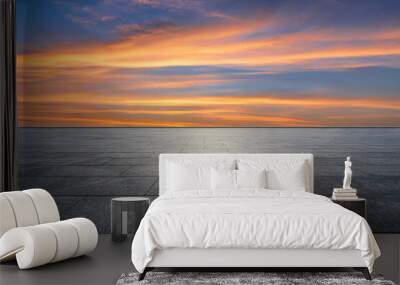 Empty square floor and sky sunset clouds background Wall mural