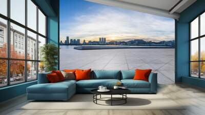 Empty square floors and city skyline at sunset. Panoramic view. Wall mural